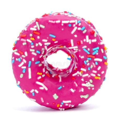 Donut Coated With A Pink Frosting And Sprinkles Of Different Col Stock