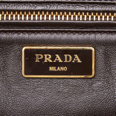 This watch is brand with stickers and comes with original box and papers with open card. Vintage Authentic Prada Ponyhair Twin Pocket Satchel w Authenticity Card LARGE For Sale at 1stdibs