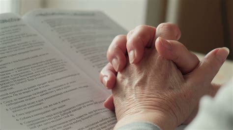 An Old Woman Prays With Hands On Bible Stock Footage Sbv 338113201
