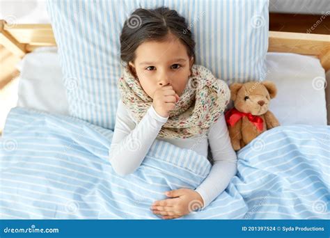 Sick Coughing Girl Lying In Bed At Home Stock Photo Image Of Sick