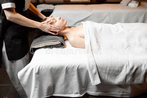 Woman Receiving Facial Massage At Spa Salon Stock Image Image Of