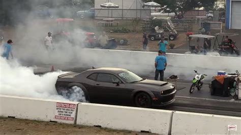 Dodge Demon Drag Races Heavily Modified Pickup Its More Competitive