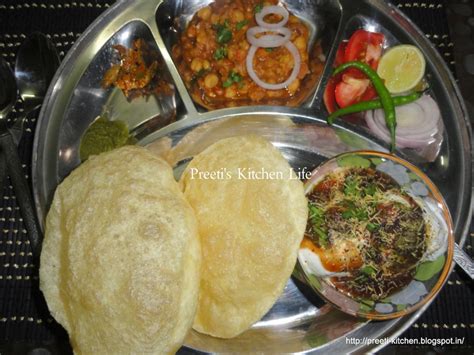 Over medium heat flame place the pressure cooker and pour oil into it. Chole Bhature- Punjabi Special | Simply Tadka