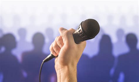 Public Speaking And Giving Speech Concept Hand Holding Microphone In