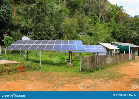 Renewable Solar Energy In A Village Of East Asia In Jungle Stock Photo
