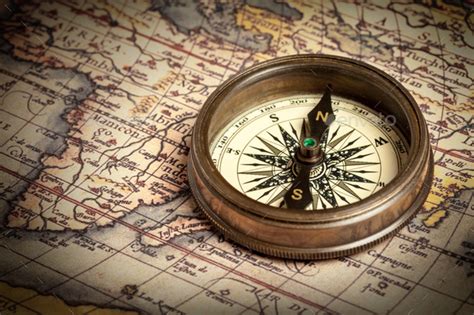 Old Vintage Compass On Ancient Map Stock Photo By Dmitryrukhlenko