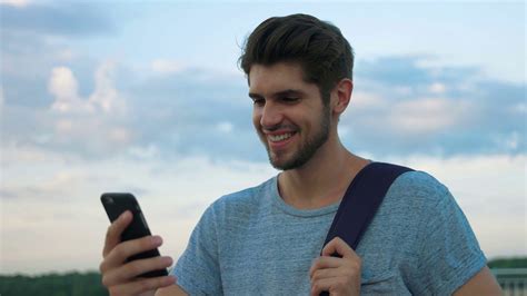 Smiling Man Using Phone Stock Footage Sbv 310031602 Storyblocks