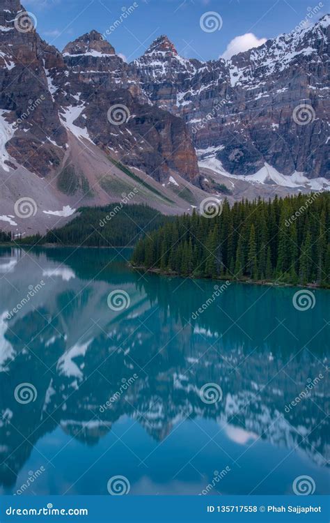 Vertical Of The Moraine Lake Sunset With Turquoise Lake And Bluesky