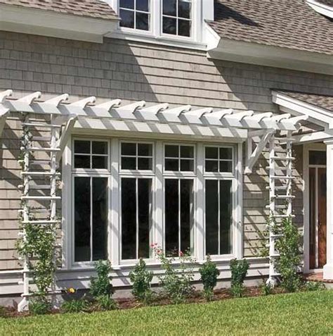 Check spelling or type a new query. A shallow pergola and trellises give definition to this ...