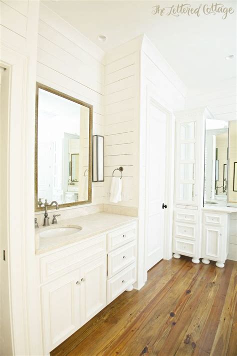 Of course, the cause is the lighter and softer hues of the things. Traditional Bathroom | White Cabinetry | Wood Wall | The Lettered Cottage | Wood floor bathroom ...