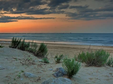 Our orange beach, gulf shores beach wedding packages can include wedding arch setup. Michael Pancier Photography Blog: Sunset over Lake Erie