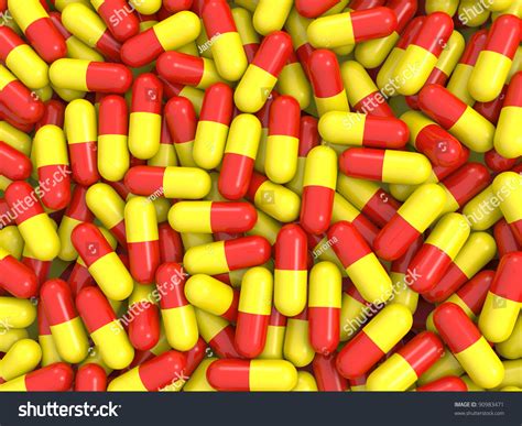 Red And Yellow Capsule Shaped Pills Background Stock Photo 90983471