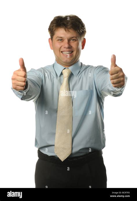 The Young Businessman With Approving Gesture With The Lifted Greater