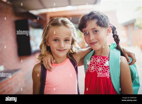 Two Cute Kids With Arms Around Each Other Stock Photo Alamy