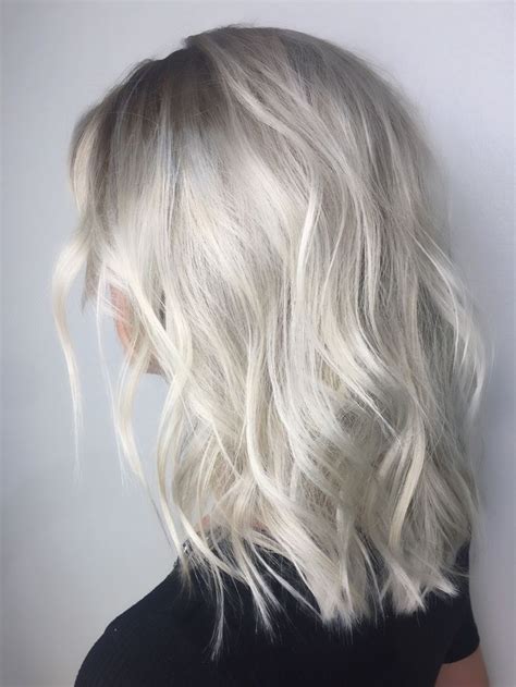 Medium Length Platinum Ice Blonde With Shadowed Roots And Lived In