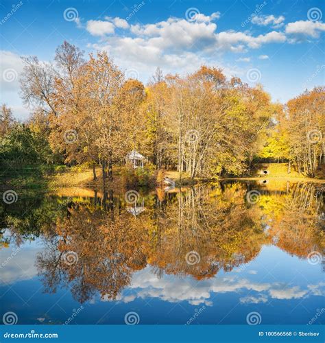 Sunny Autumn In The Park Over Lake Stock Photo Image Of Clouds Light