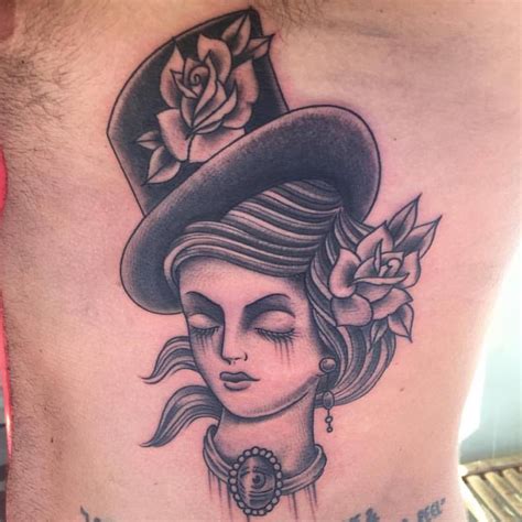 Face Of A Lady In A Top Hat Tattoo By Jared Maui Tattoo Artist At