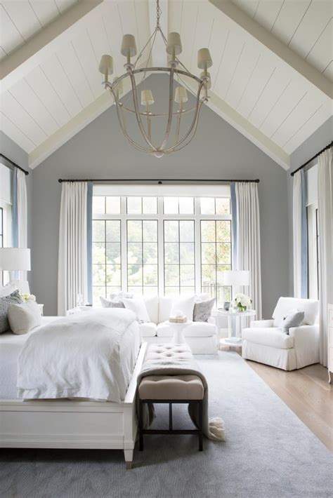 If you can't fix the ceilings, just roll some bright paint on the walls and take sometimes, a simple change in bedding can make a huge difference in a bedroom. Transitional Neutral Master Bedroom With Vaulted Ceilings ...