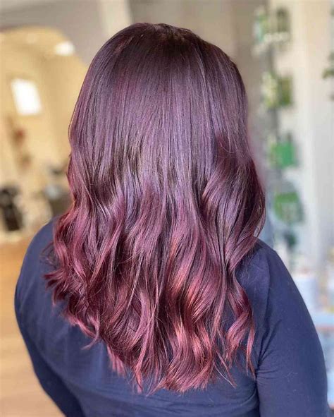 get ready to set the fashion scene on fire with these stunning red ombre hair color ideas from