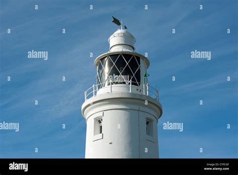 Lighthouse With Weather Vane Stock Photo Alamy