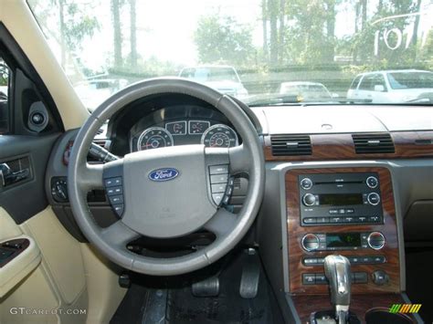 2009 Ford Taurus Sel Medium Light Stone Dashboard Photo 38522285