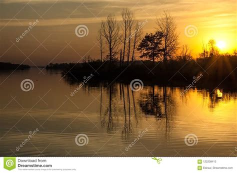 Landscape Sunset Over The Lake Fall Trees Reflected In Water Stock