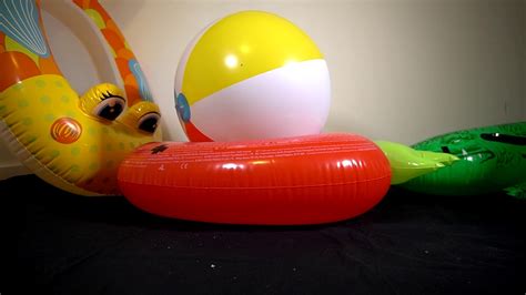Popping Inflatables Swim Ring And 24 Inch Beachball Youtube