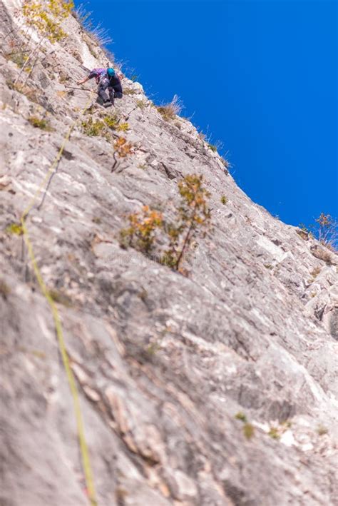Man Rock Climbing Up Steep Mountain Stock Image Image Of Outdoors