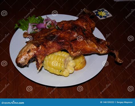 Close Up View To Grilled Cuy Aka Guinea Pig Traditional Peruvian Dish