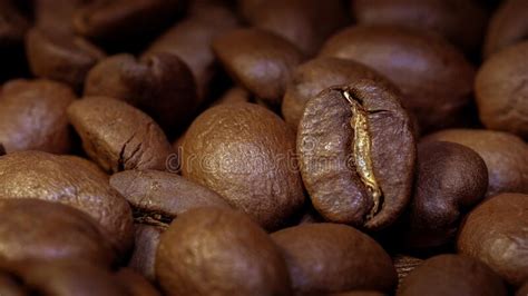 Roasted Coffee Beans Closeup Background Coffee Grains Scattered On The