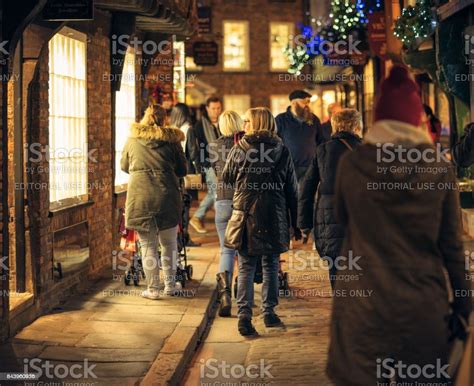 People Christmas Shopping On A Old Fashioned Street In York Stock Photo