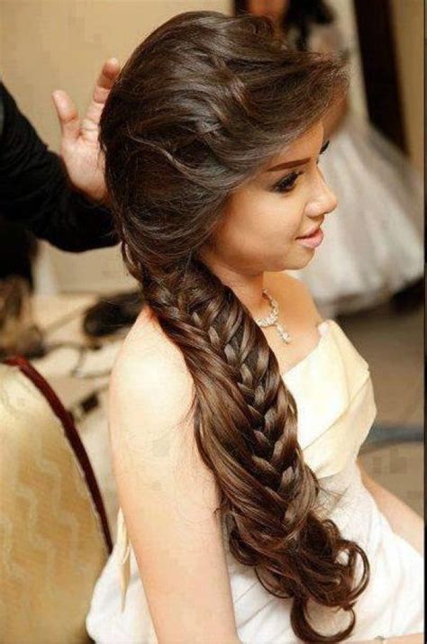 A low wavy updo with side bangs is a timeless option to go for, it always works. Long Braided Hairstyle with Side Swept Fringe | Talk ...
