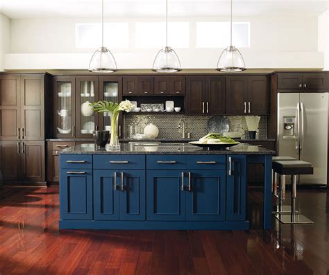 Dark Wood Cabinets With A Blue Kitchen Island Omega