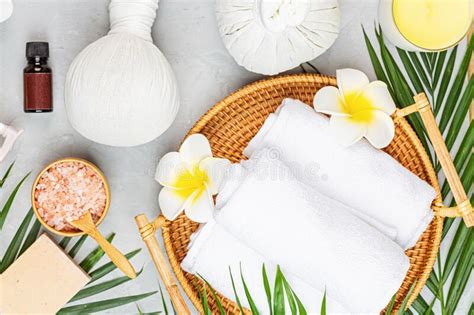 Spa Massage Aromatherapy Body Care Background Spa Herbal Balls Cosmetics Towel And Tropical