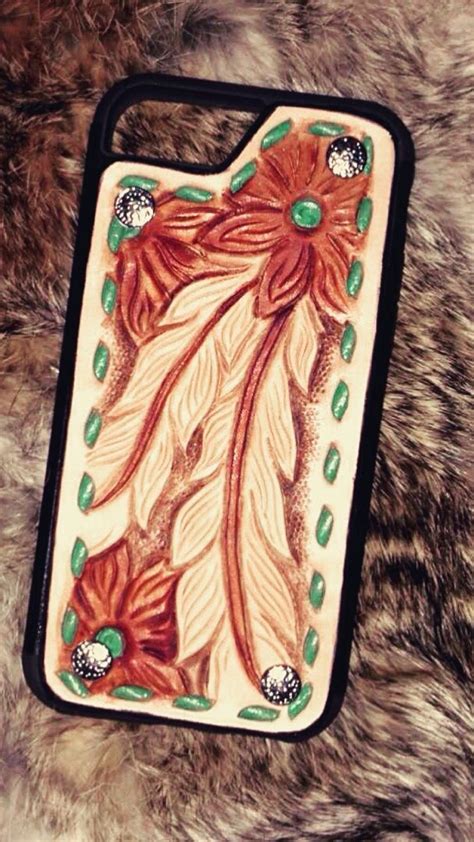 Get your phone a new skin or give it as a unique gift for your friends. Custom tooled leather phone case made by Rockin L Custom ...