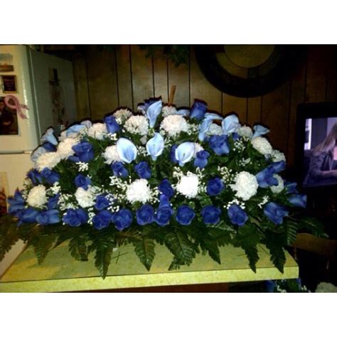 Flowers are a touching gift to send to family or friends who have recently lost a man in their life. Half casket spray I made for a male funeral... | Flower ...