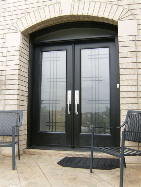 Custom Wrought Iron Door Glass And Transom With A Modern Feel