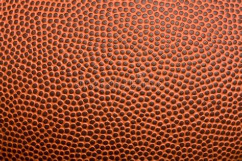 Closeup Of An Orange Leather Textured Football