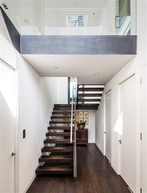 Modern Staircase With Dark Wood Treads Open Riser And Steel Handrail