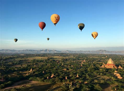 Hot Air Balloon Ride Over The Temple Field In Bagan Myanmar Rtravel