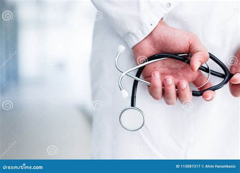 Doctor With Stethoscope In Hand Stock Image Image Of Indoor Coat