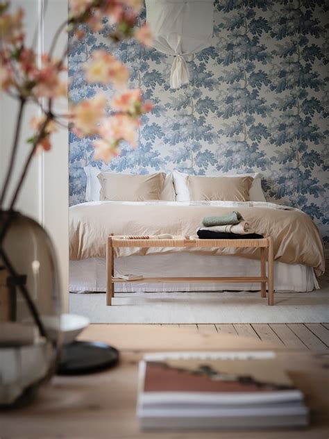 Delicate Bedroom With Floral Wallpaper And Natural Ambience