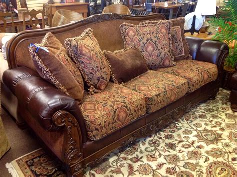 Sophie wood trim fabric sofa. Leather and fabric sofa with wood trim and throw pillows ...