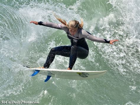 Female Surfer At Surf City Usa Huntington Beach Southern California