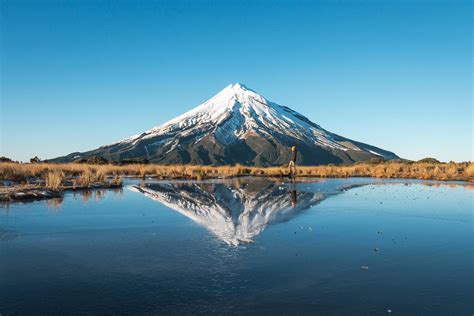 Reflections At Mt Taranaki In New Zealand We Said Go Travel