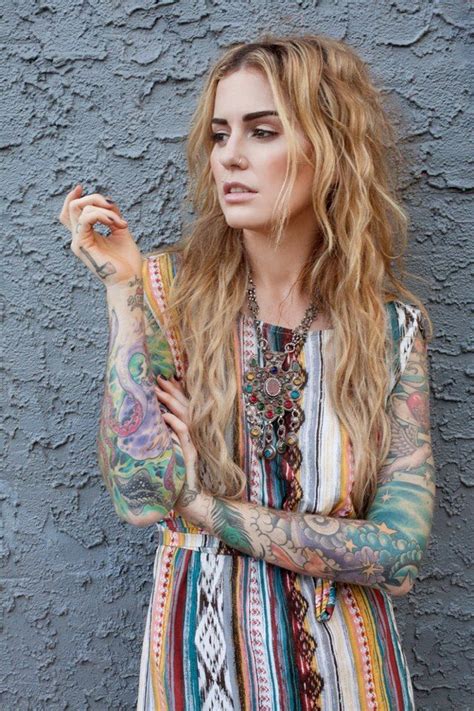 Full Sleeves Tattooed Blonde Girl In A Colorful Dress