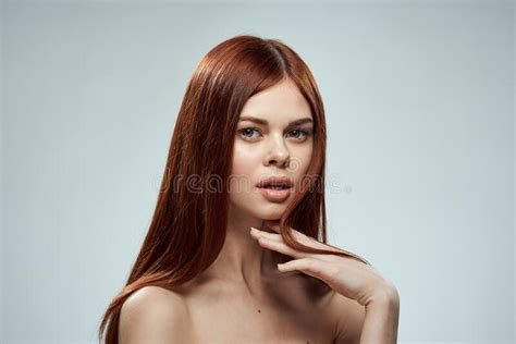 Beautiful Red Haired Woman Naked Shoulders Cosmetics Long Hair Glamor Light Background Stock