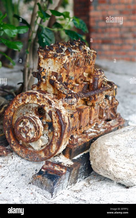 Rusted Engine Block On Beach Stock Photo Alamy