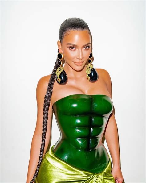 Kim Kardashian Wears Metal Corset With Fake Abs For Christmas Eve Dinner As Husband Kanye West