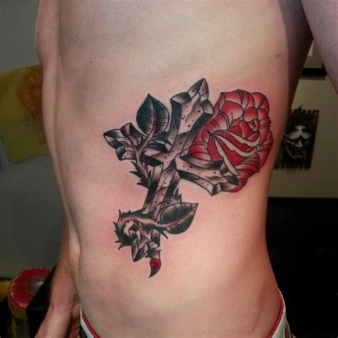 Rose flowers are magical and visually captivating given the adorable colors that they come with. Cross Rose Tattoo. #tattoos | Angel's & Crosses & Roses ...